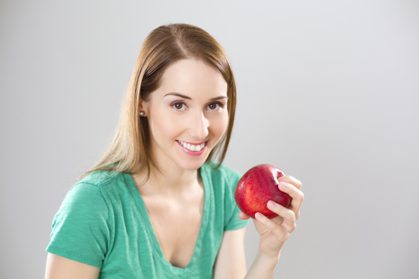 Graduate-diploma-in-human-nutrition-ara-a-girl-with-an-apple-resized